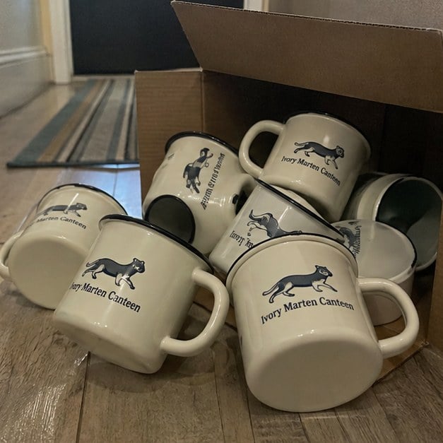 Enamel mugs with logo — customer photo